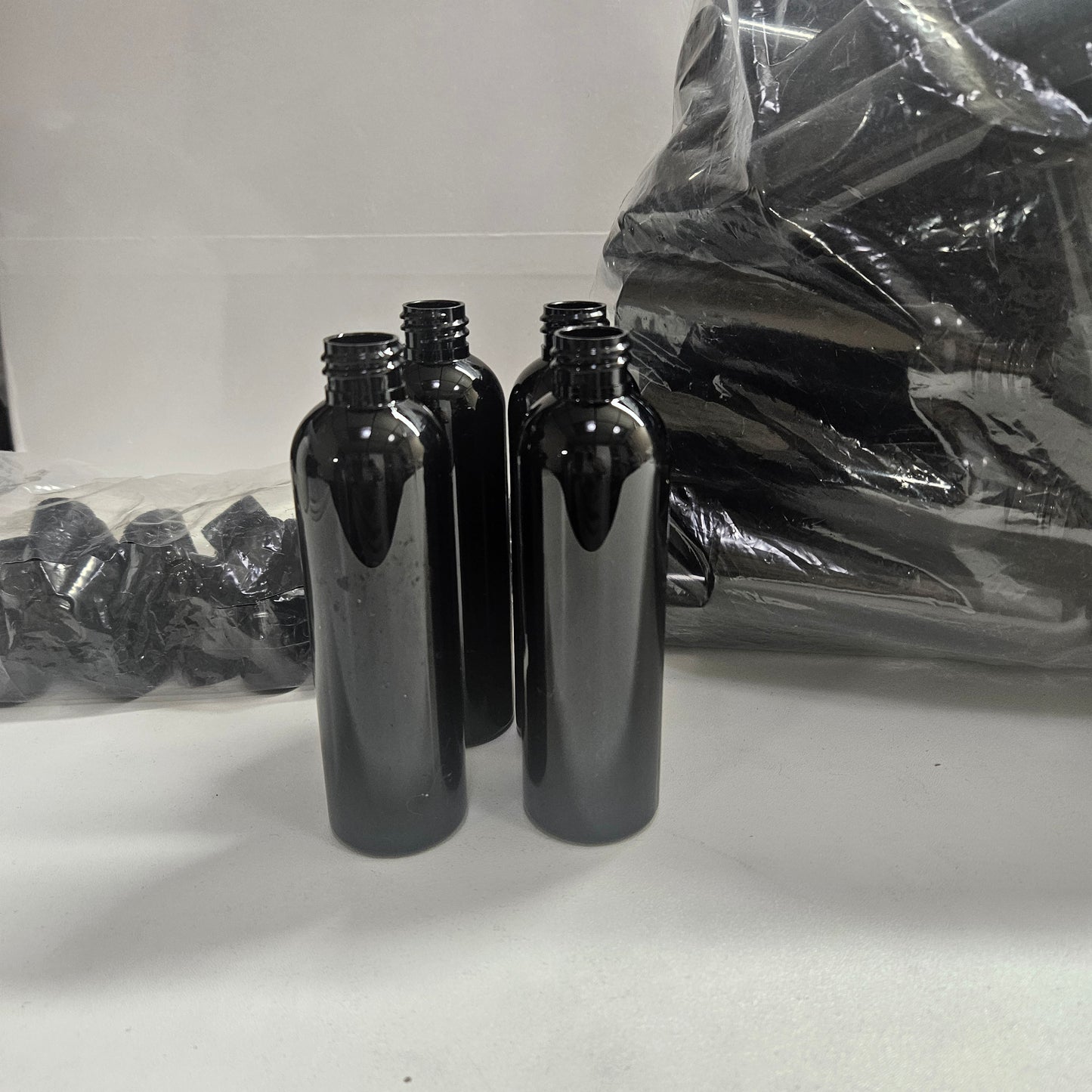 78- 4oz Black Black Bullet bottles